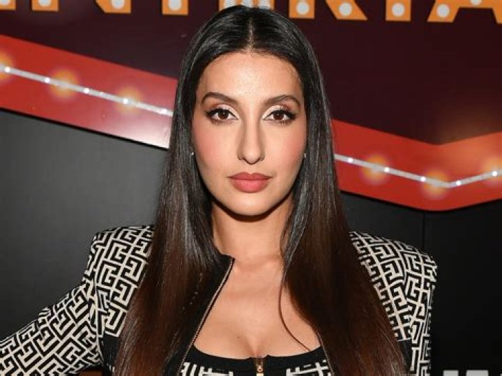 Nora Fatehi in Bathing Suit is "All About Colors" — Celebwell